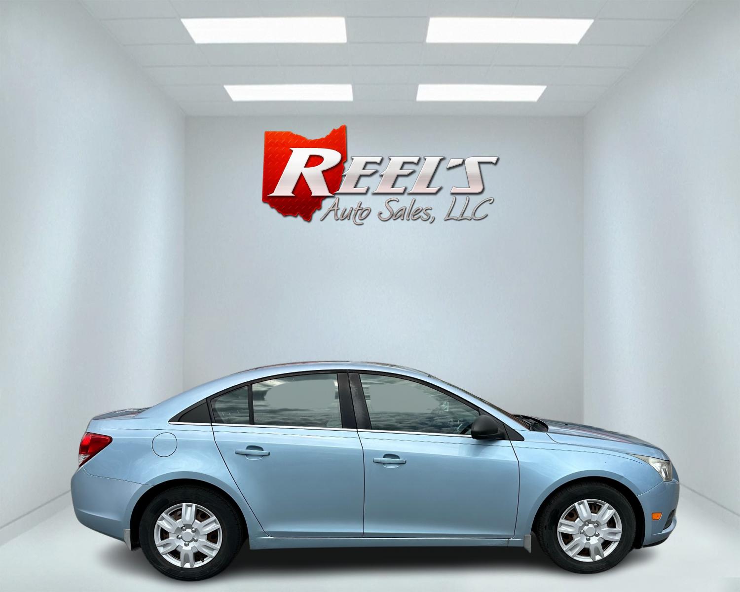 2011 Blue /Black Chevrolet Cruze LS Auto (1G1PC5SHXB7) with an 1.8L I4 DOHC 16V engine, 6-Speed Automatic transmission, located at 547 E. Main St., Orwell, OH, 44076, (440) 437-5893, 41.535435, -80.847855 - Photo #4